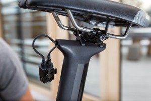 Attach the Di2 junction box below the saddle. This can either be done directly on the seatpost (with Loctite) or on the saddle rails (with cable ties).